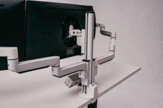 Why a monitor arm is a good addition to an ergonomic workplace.